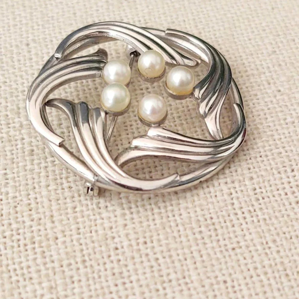 Vintage Simmons sterling and pearl brooch